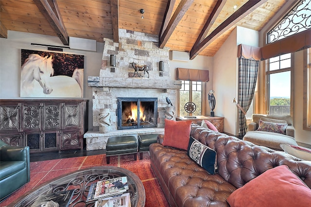 living room with wood ceiling, lofted ceiling with beams, a stone fireplace, and wood finished floors