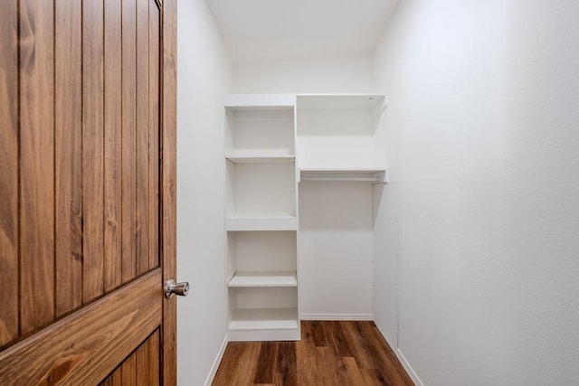 38 Private Dr Unit 1548, Espanola, NM 87537 - walk in closet with dark wood-style floors