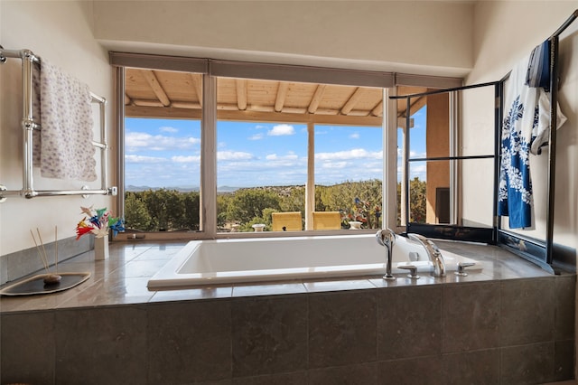 bathroom featuring a bath