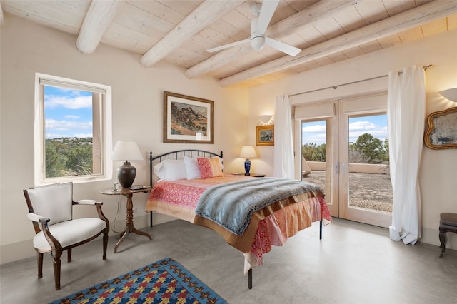 bedroom featuring multiple windows, wooden ceiling, and access to outside