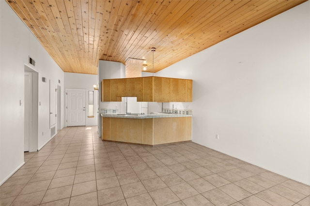 kitchen featuring visible vents, light tile patterned flooring, wood ceiling, a peninsula, and hanging light fixtures