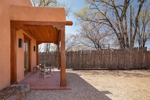 6 El Nido Ln, Santa Fe, NM 87506 - view of yard with fence and a patio area