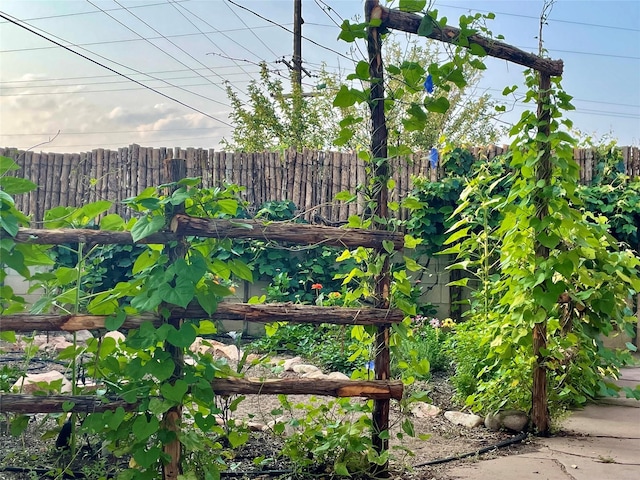 view of yard featuring fence