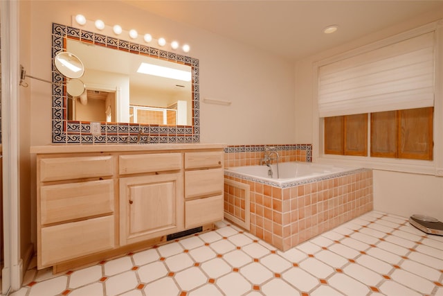full bathroom with a bath, vanity, tile patterned floors, and a stall shower