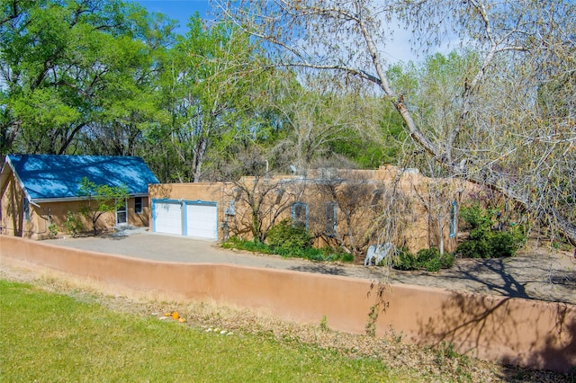 view of yard featuring an attached garage