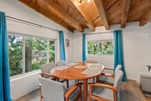 7689 Old Santa Fe Trl Unit C, Santa Fe, NM 87505 - dining space featuring wooden ceiling, hardwood / wood-style flooring, and vaulted ceiling with beams