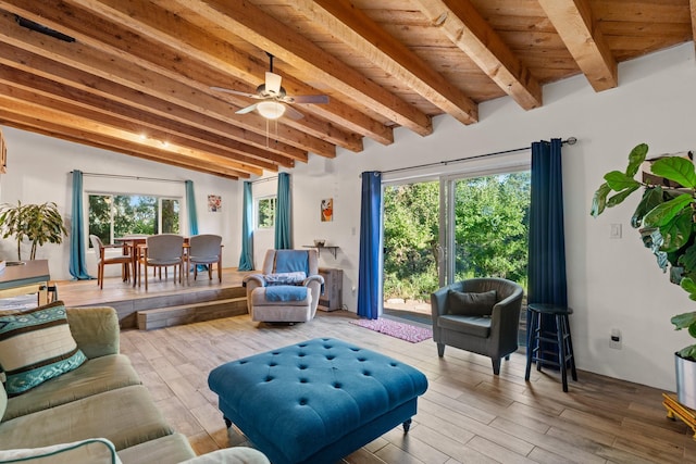 7689 Old Santa Fe Trl Unit C, Santa Fe, NM 87505 - living room with wood finished floors, a ceiling fan, plenty of natural light, and beam ceiling