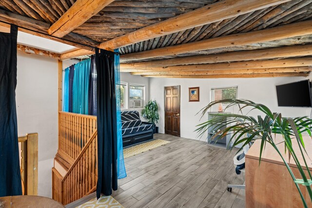 7689 Old Santa Fe Trl Unit C, Santa Fe, NM 87505 - miscellaneous room featuring beamed ceiling and wood finished floors