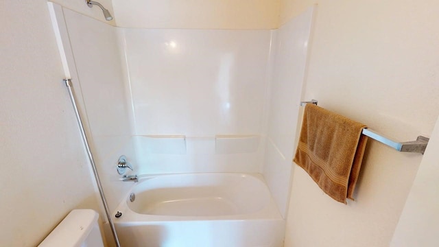 full bathroom with toilet and bathing tub / shower combination