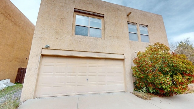 garage featuring driveway