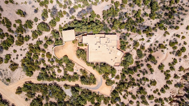 bird's eye view with a rural view and view of desert