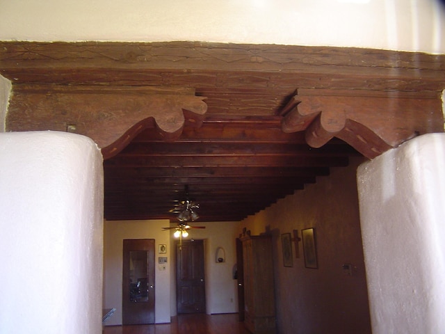 hall with wood finished floors
