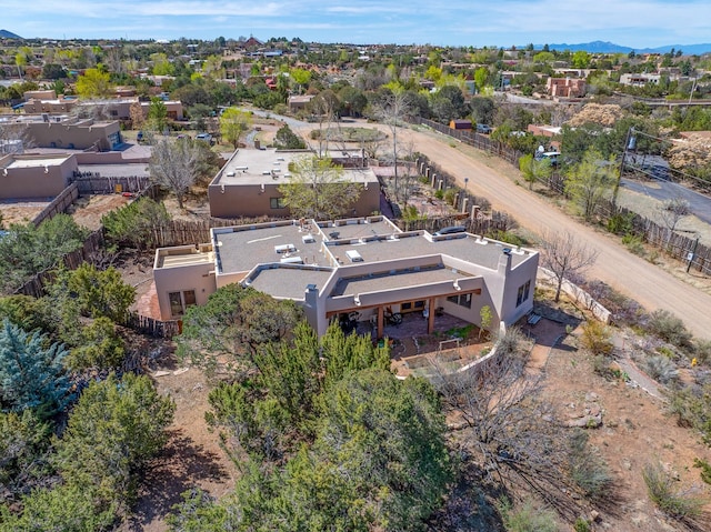 birds eye view of property featuring a mountain view