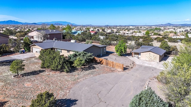 birds eye view of property featuring a residential view and a mountain view