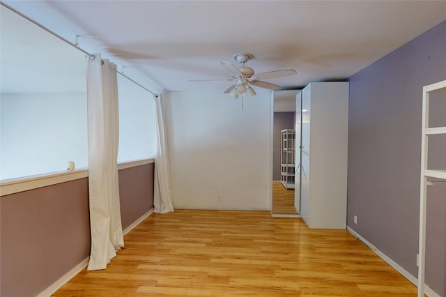 4715 Quemazon, Los Alamos, NM 87544 - unfurnished room with light wood finished floors and ceiling fan