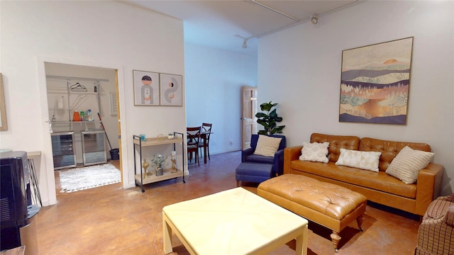 4715 Quemazon, Los Alamos, NM 87544 - living room featuring track lighting, concrete floors, and beverage cooler