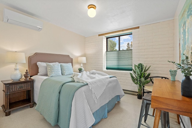 bedroom featuring a wall unit AC, brick wall, and light colored carpet