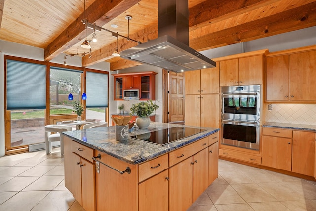 kitchen with island range hood, stainless steel appliances, beamed ceiling, and light tile patterned floors