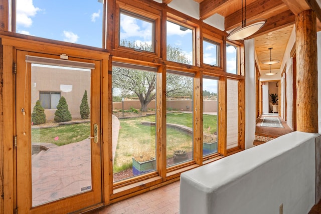 interior space featuring beam ceiling