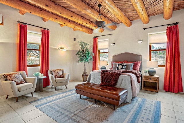 bedroom with wooden ceiling, tile patterned flooring, and multiple windows