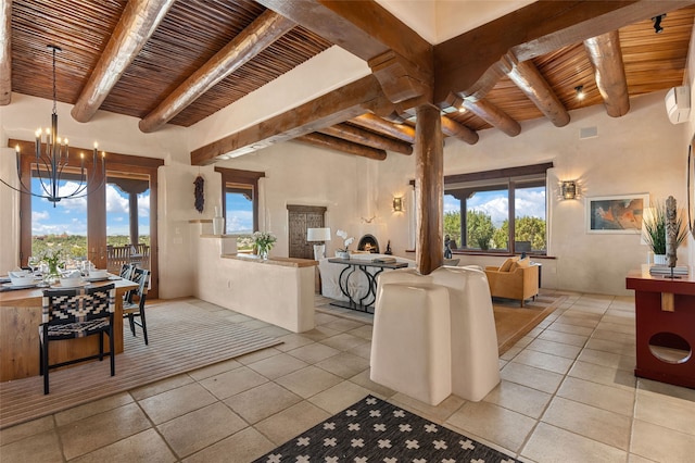 living room featuring wood ceiling, a healthy amount of sunlight, a notable chandelier, and beam ceiling