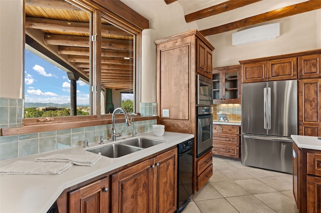 kitchen with a wall mounted air conditioner, a sink, beamed ceiling, backsplash, and appliances with stainless steel finishes