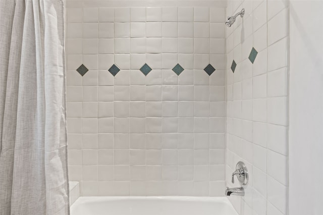 full bath featuring shower / bathtub combination with curtain