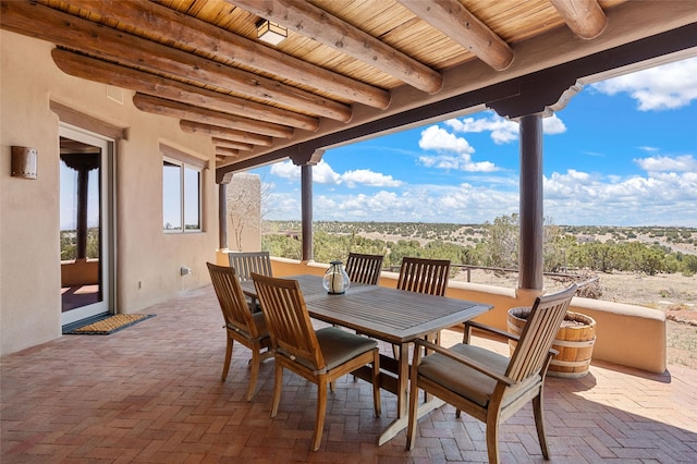 view of patio featuring outdoor dining area