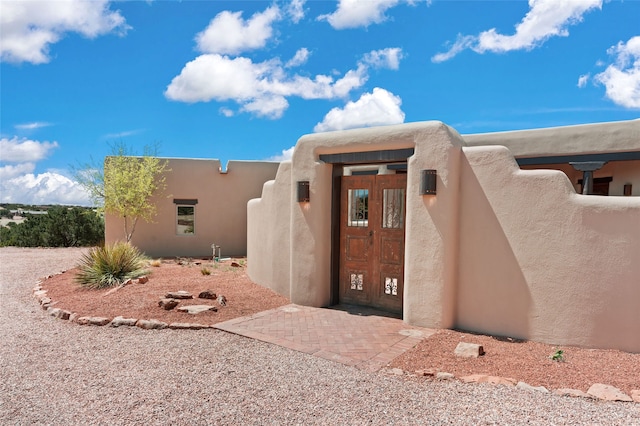 exterior space featuring stucco siding