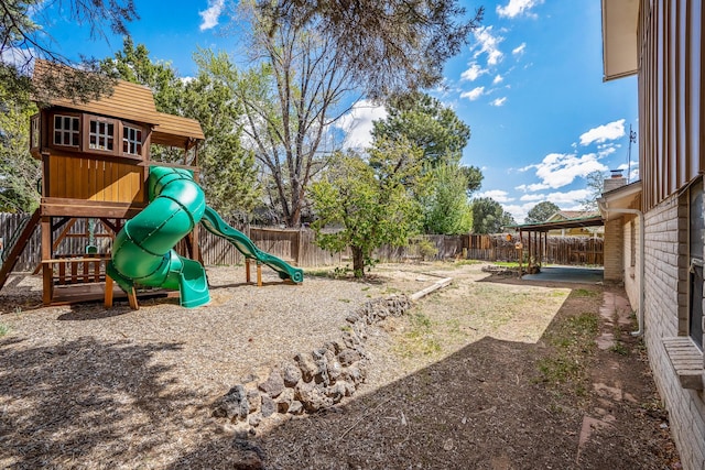 view of jungle gym with a fenced backyard