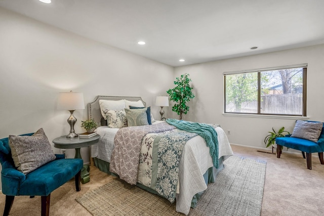 bedroom featuring recessed lighting, carpet floors, and baseboards