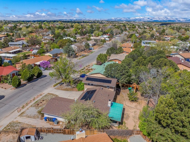 drone / aerial view featuring a mountain view and a residential view