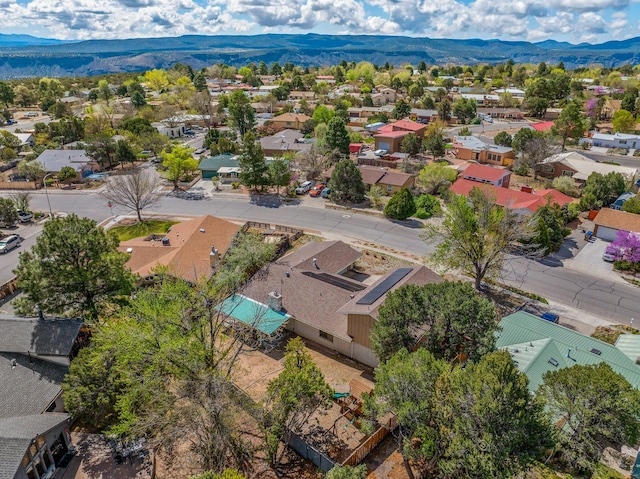 drone / aerial view with a mountain view and a residential view