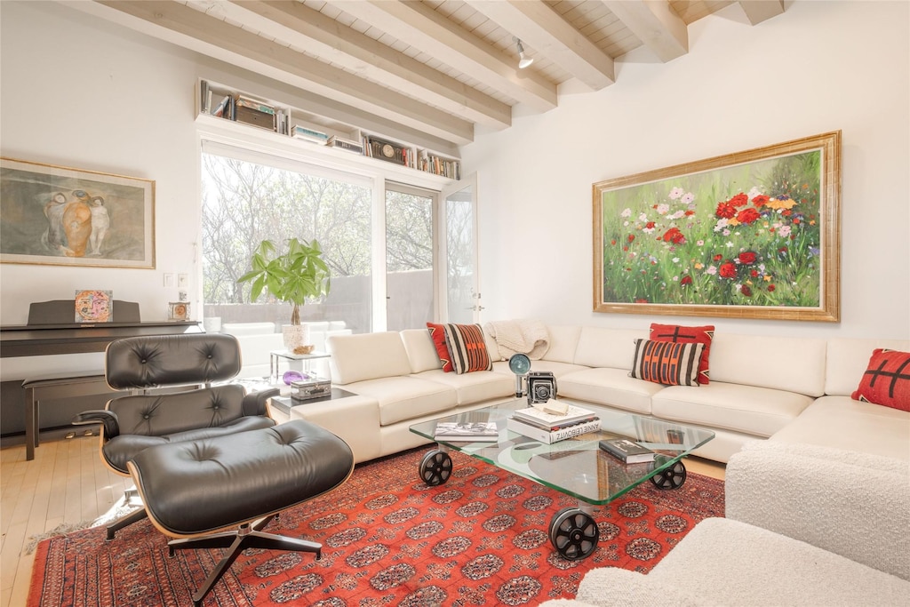 611 Alarid St Unit B, Santa Fe, NM 87505 - living room featuring a ceiling fan, wood finished floors, and beam ceiling