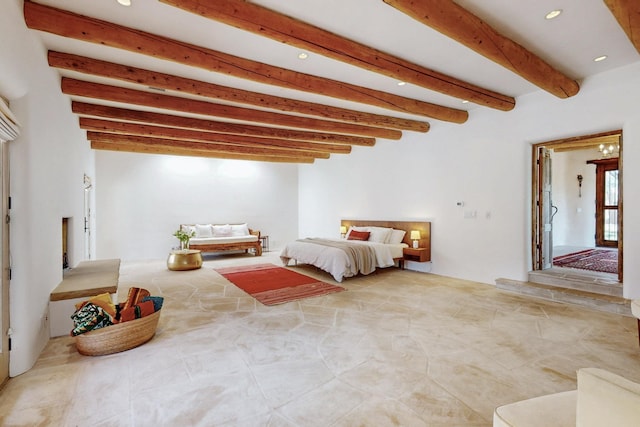 bedroom with beamed ceiling and recessed lighting