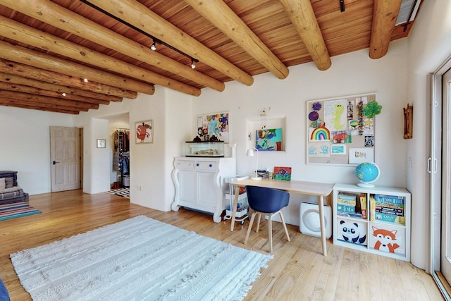 office area with beamed ceiling, light wood-style floors, and wooden ceiling