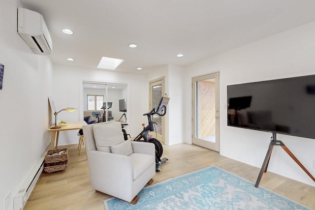 interior space with an AC wall unit, a skylight, a baseboard heating unit, light wood finished floors, and recessed lighting