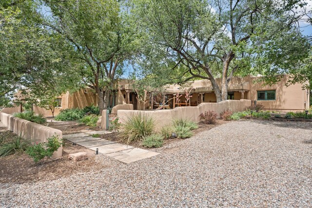 exterior space featuring a fenced front yard