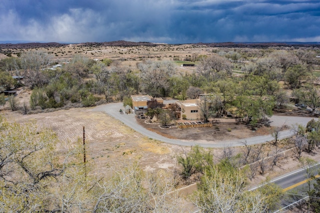 birds eye view of property with a rural view