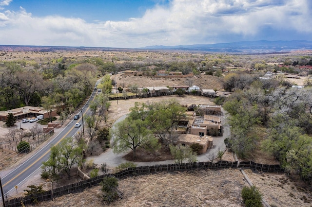 drone / aerial view featuring a mountain view