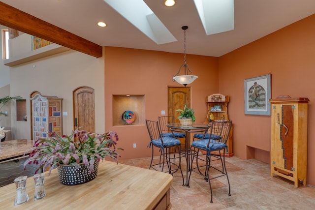 21 Canada Vista Dr, Sandia Park, NM 87047 - dining space with lofted ceiling with skylight and recessed lighting