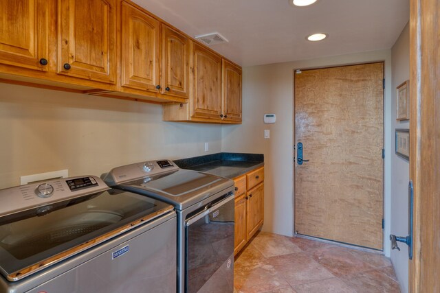 21 Canada Vista Dr, Sandia Park, NM 87047 - clothes washing area with washing machine and dryer, cabinet space, visible vents, and recessed lighting