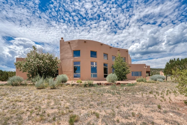 21 Canada Vista Dr, Sandia Park, NM 87047 - view of home's exterior featuring stucco siding