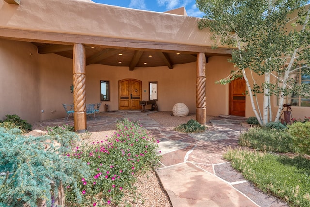21 Canada Vista Dr, Sandia Park, NM 87047 - view of exterior entry with stucco siding