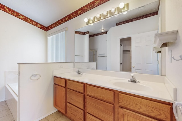 bathroom with tile patterned flooring, double vanity, an enclosed shower, a sink, and a bath