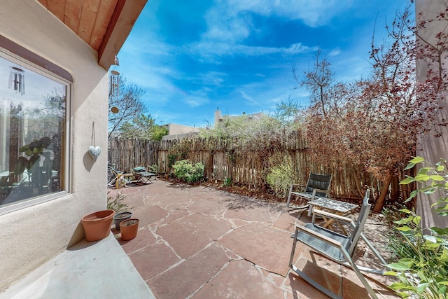 view of patio with a fenced backyard