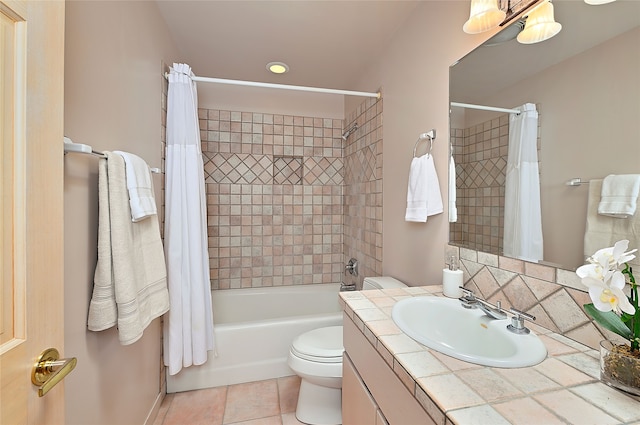 bathroom with recessed lighting, tile patterned flooring, toilet, vanity, and shower / bath combo with shower curtain
