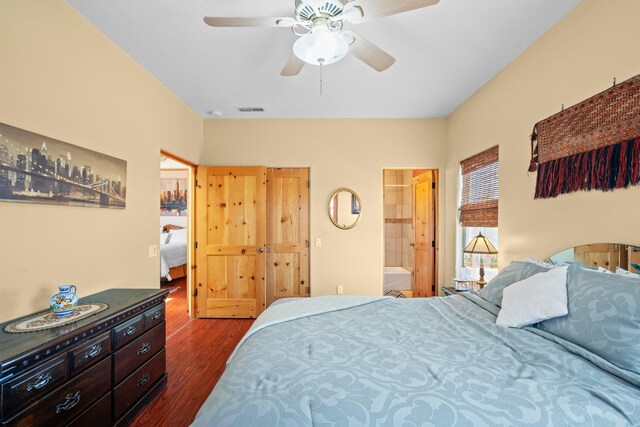 bedroom featuring visible vents, a ceiling fan, and dark wood-style flooring