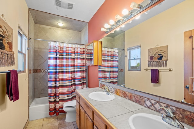 full bath with shower / tub combo, visible vents, a sink, and toilet