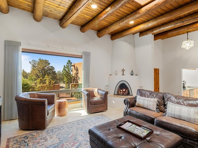 living room featuring a fireplace, beam ceiling, wood ceiling, and recessed lighting